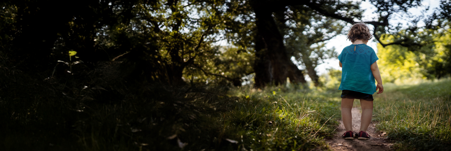 Closeup of mother and daughter holding hands