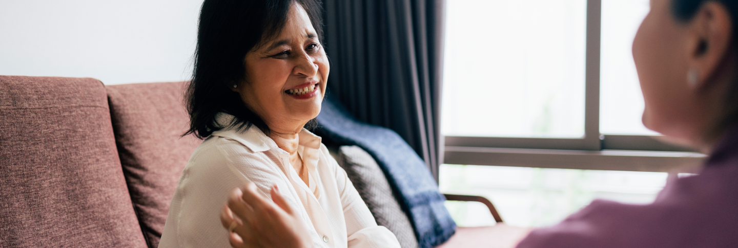 Daughter embracing her mother